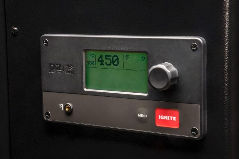 Traeger Pro 575 Pellet Grill Controller close up showing 450 degrees on screen